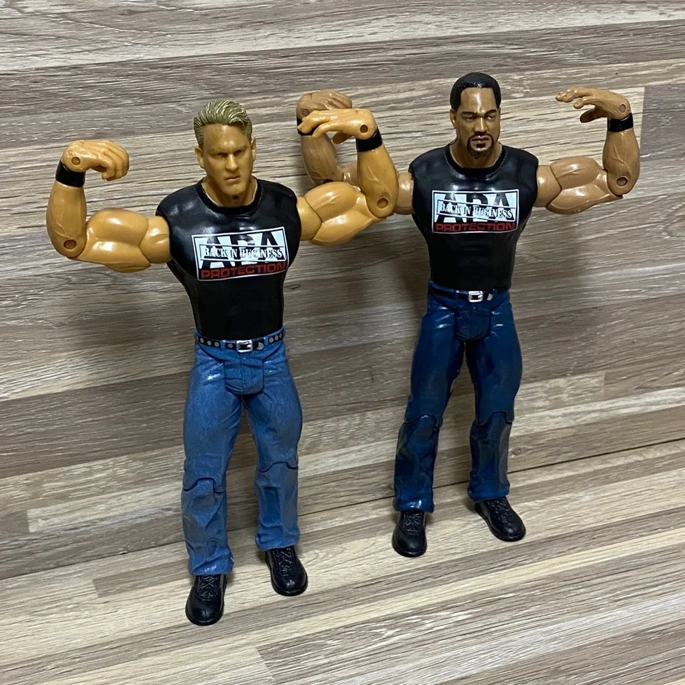 WWE Wrestling Action Figures with Black Shirts and Blue Jeans